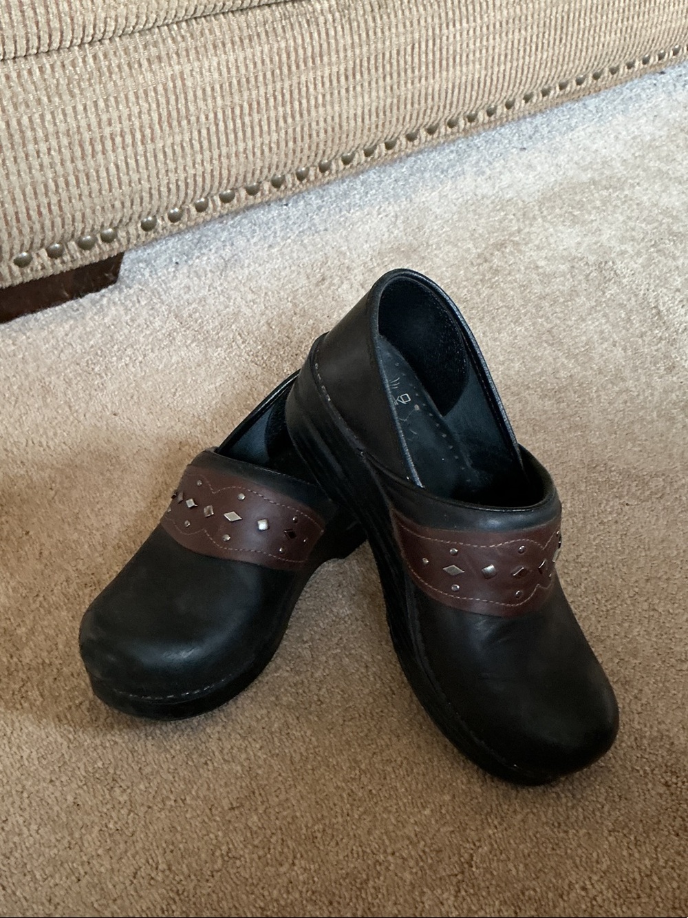 Dansko Black Leather Clogs with Brown Decorative Strap